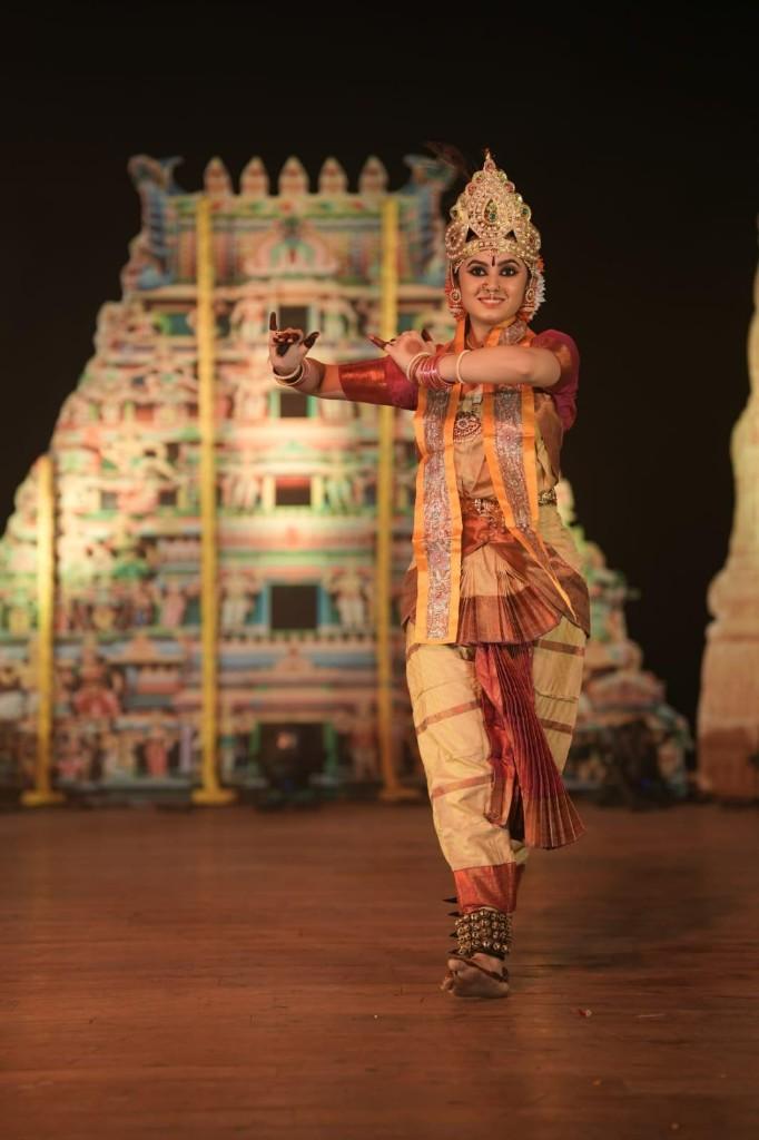 Classical dancer on stage with full performance makeup by Nensi